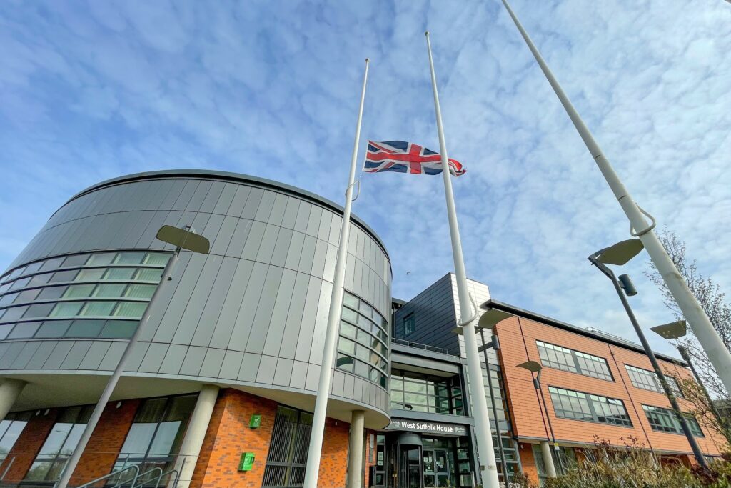 Flag at half-mast outside office building